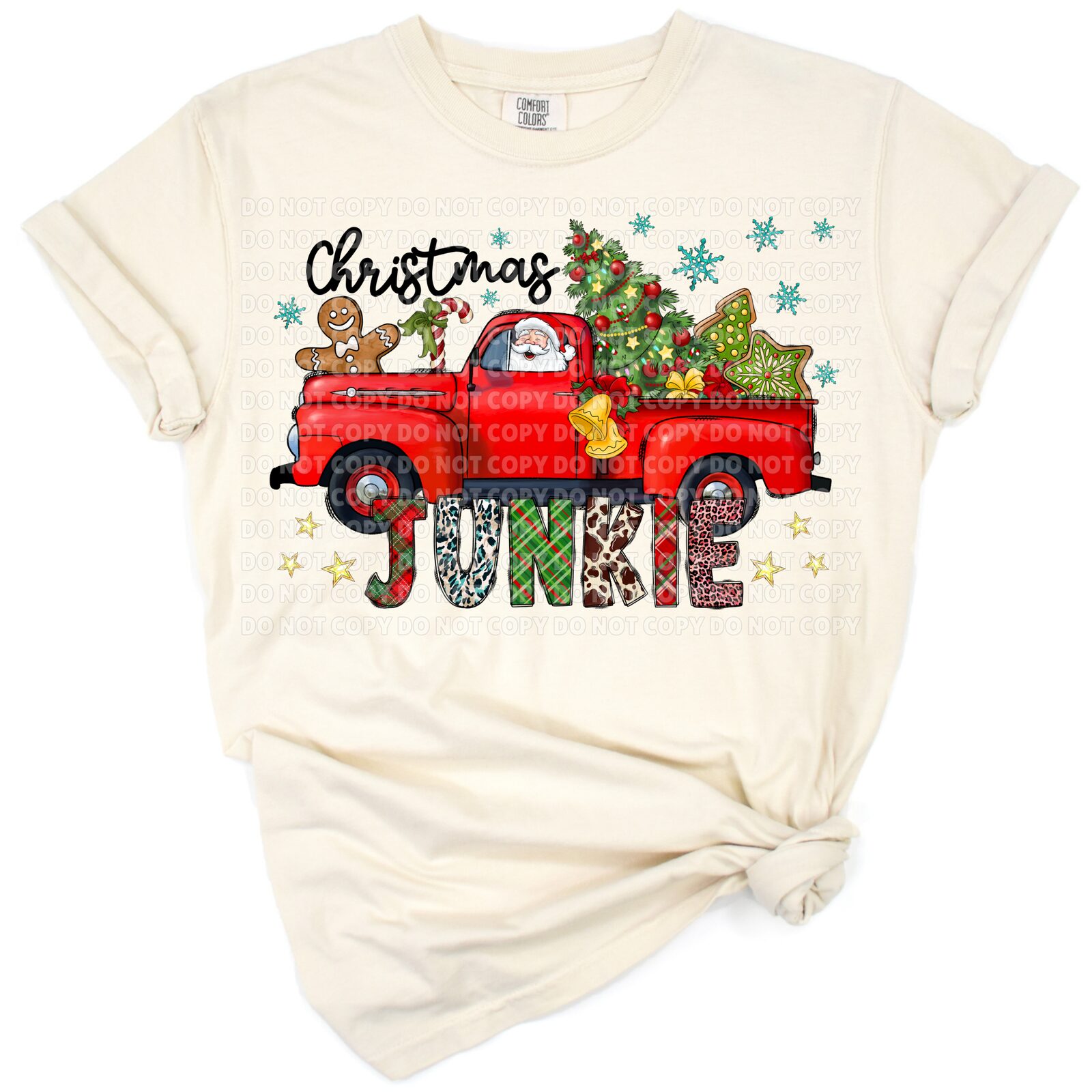 A vintage truck with a Christmas tree and western holiday accents.