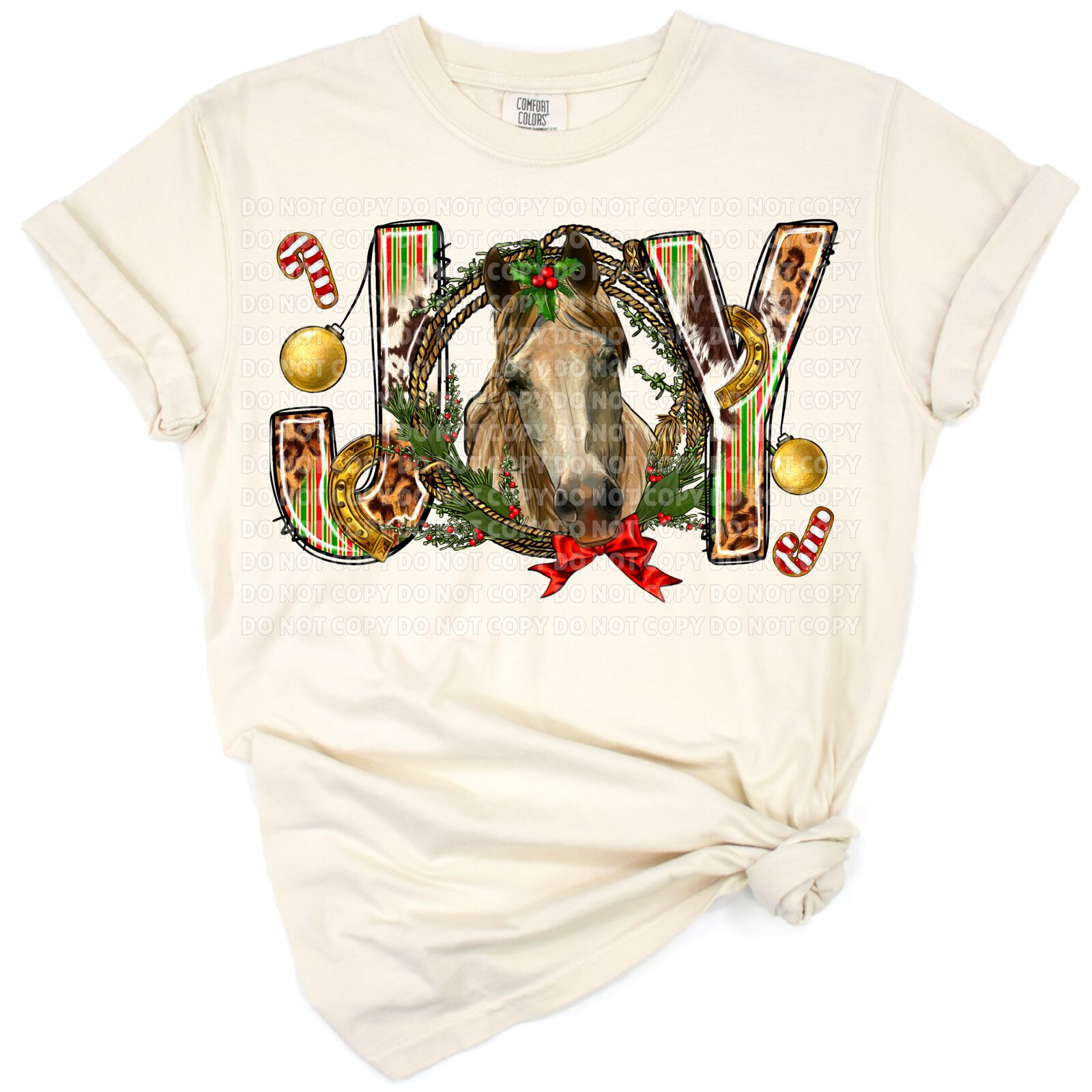 A western style Christmas design featuring the word Joy with a horse and festive holiday accents.