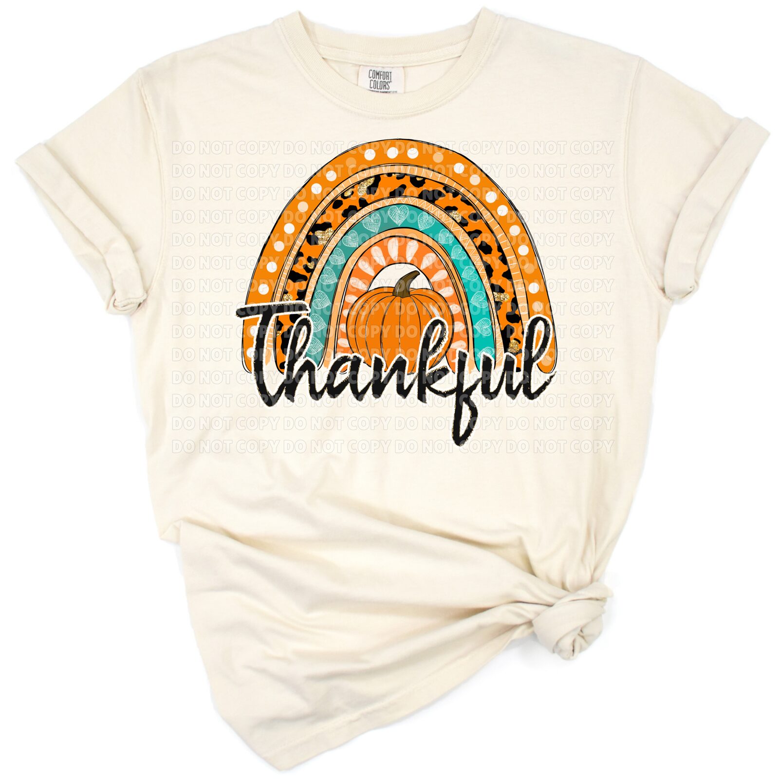 A hand drawn rainbow with pumpkins in autumn colors, perfect for Thanksgiving season.