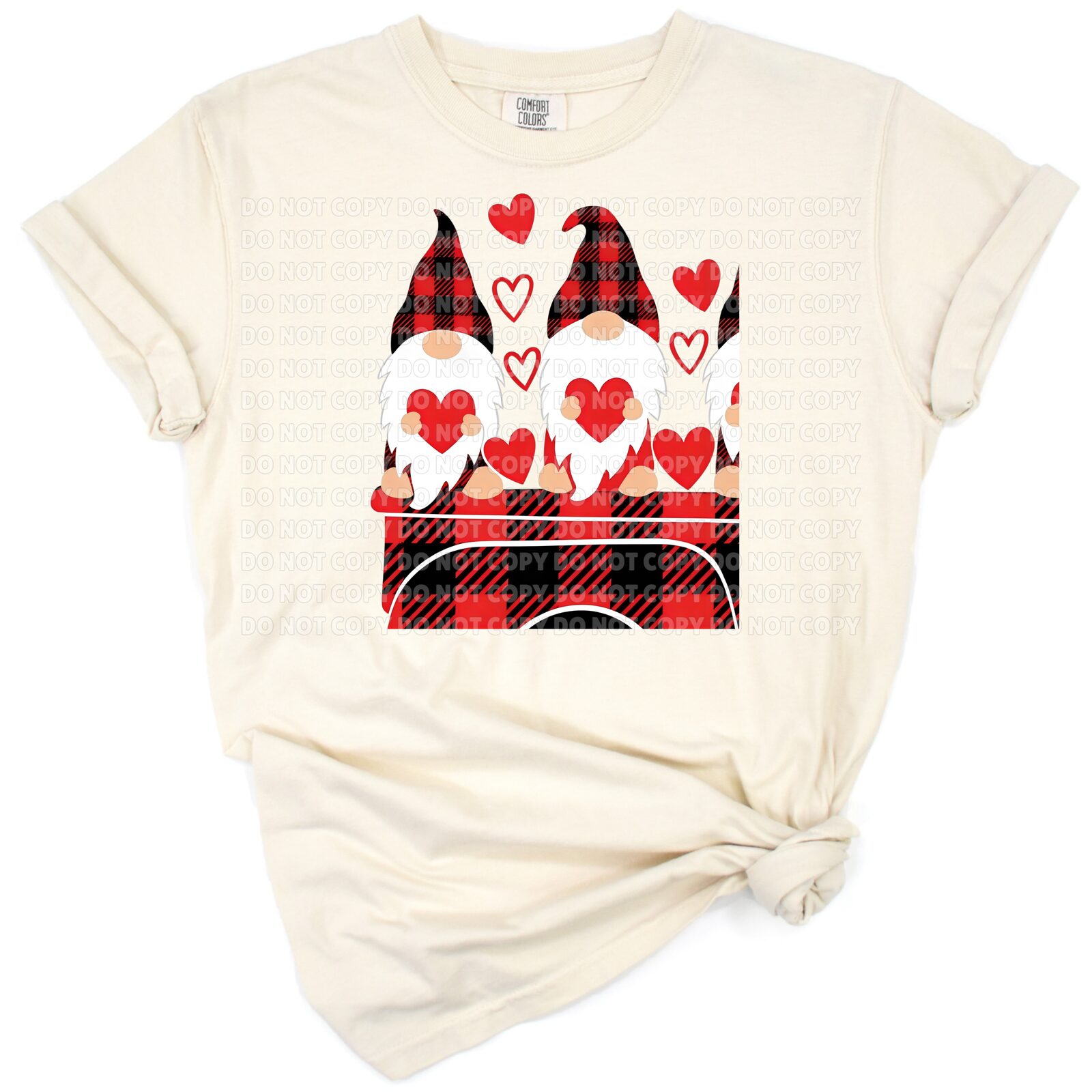 Three gnomes ride in a vintage buffalo plaid truck filled with hearts for Valentine's Day.