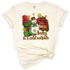 A cozy Christmas sweater and boots in a festive winter holiday scene.