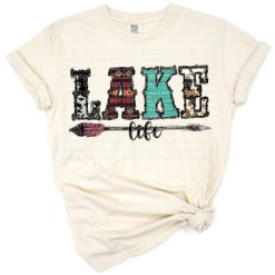 Hand drawn lake life western design with cowhide, aztec patterns, and arrows.