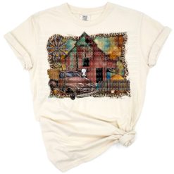A rustic country barn scene with a vintage farm truck, cow, windmill, leopard pattern, and cowhide accents.