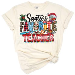 Santa in western style holding an apple with Christmas classroom elements