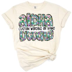 A set of hand drawn letters decorated with floral doodle designs and flowers.