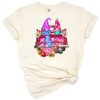 A whimsical group of Easter gnomes with a pastel farm truck and spring holiday decorations.