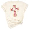 A pink watercolor floral gold cross with delicate blossoms in a soft spring style.