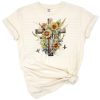 A decorative cross intertwined with colorful sunflowers and floral accents, featuring a subtle religious motif.