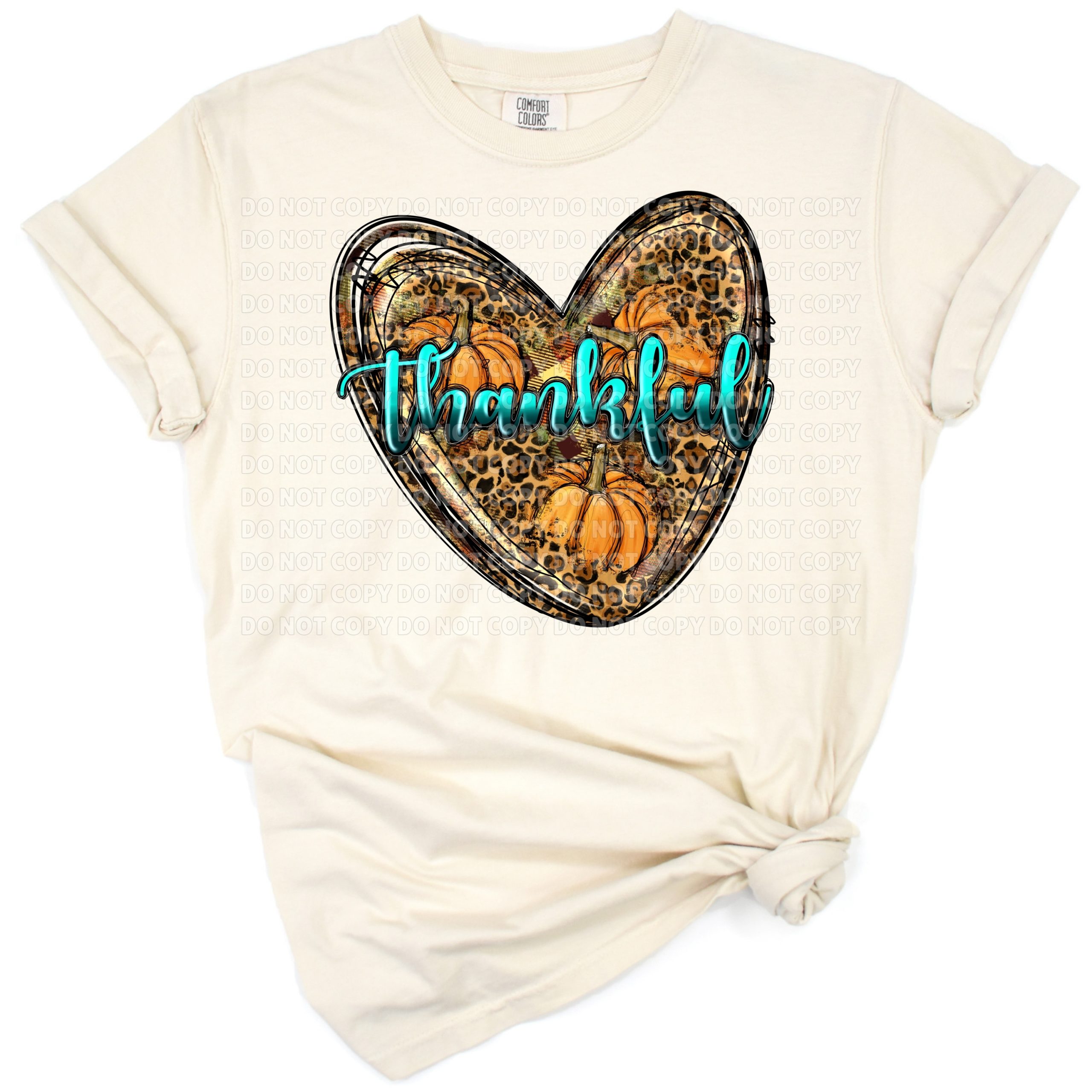 A pumpkin shaped like a heart with western style decorative accents.