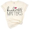 Cheerful kindness matters quote with decorative accents and uplifting style