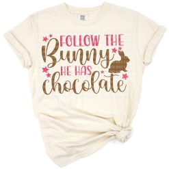 A cute bunny holding chocolate with playful Easter elements.