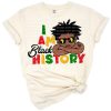 Grunge-style illustration of an Afro boy with vibrant colors and inspirational Juneteenth theme.