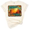 A distressed desert sunset with leopard print and sunflower accents in a boho style.