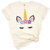 A whimsical unicorn with a colorful floral crown in a cute, dreamy style.