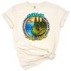 Artwork with a relaxed lake time theme featuring western camp life in a cheerful summer setting.