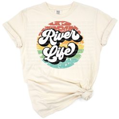 A rustic river scene with stylish Life is Better on the River text and natural outdoor elements.