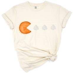 Cartoon pumpkin pie slice chasing dots in a Pac-Man inspired style.