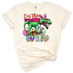 A playful dinosaur with colorful Easter eggs on a spring background.