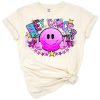 A western smiley face with a pink ribbon for breast cancer awareness and hope.