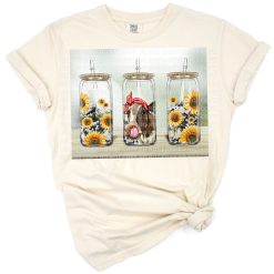 A western cow with sunflowers in a bright country floral style.