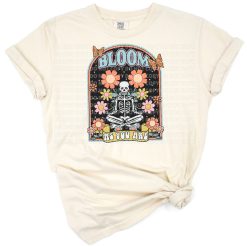 A retro style skeleton surrounded by blooming flowers in a vintage, distressed art design.