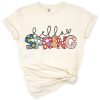 Playful and cute design with spring flowers, Easter motifs, and a cheerful mom life theme.
