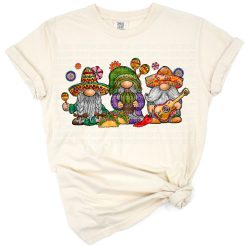 A playful gnome wearing a leopard print hat with Mexico-inspired western details.