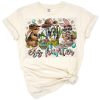 A whimsical bunny holding Easter eggs with turquoise and western accents.