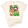 Cheerful festive design featuring dad and baby celebrating their first Christmas together.