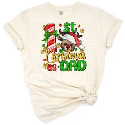 Cheerful festive design featuring dad and baby celebrating their first Christmas together.