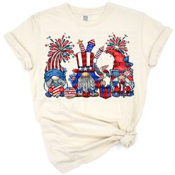 A cute gnome wearing a red, white, and blue hat holding fireworks, surrounded by stars.