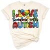 A heartwarming design with a coffee cup and colorful autism awareness puzzle pieces.