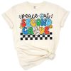 Retro boy with peace sign and groovy second grade school style artwork