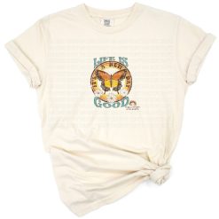 A retro vintage styled sun rising artwork with the phrase life is good and cheerful colors.