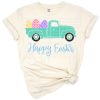 A colorful truck with an Easter bunny and decorated eggs surrounded by spring elements.