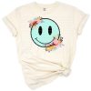 A retro-style smiley face in autumn colors with cozy fall vibes.