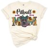 A cute pitbull dog with sunflowers in a western country style, perfect for dog moms.