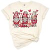 A cute Valentine gnome holding hearts surrounded by XOXO and love motifs.