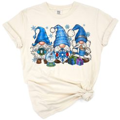 A festive illustration of snowman and leopard print gnomes with winter and holiday accents.