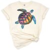 A hand drawn colorful tie dye turtle with playful patterns.