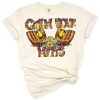 A cheerful softball illustration with playful handwritten phrase and sporty elements.