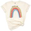 A vintage rainbow in a retro style with faded colors on a shirt design.