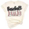 Bold distressed design featuring the word Dad with red baseball laces accents.
