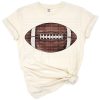 A distressed illustration of an American football with bold sporty details.