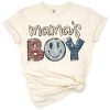 Grunge style artwork featuring the phrase Mama's Boy with distressed text and playful accents