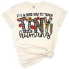 Leopard print apple and pencil graphic with playful teacher phrase.