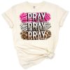 Western retro style artwork featuring the phrase pray over it with faith-inspired accents.