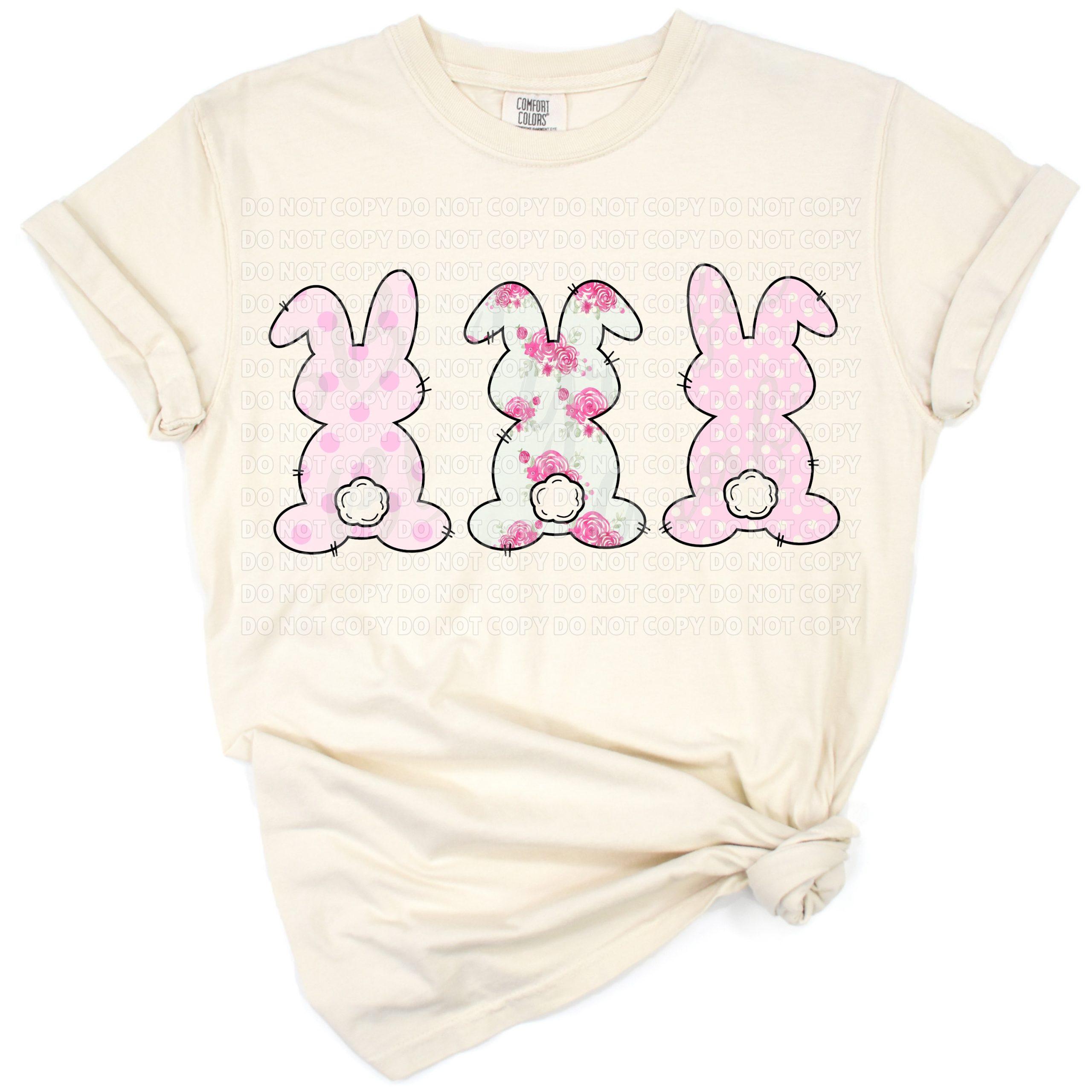 Three pastel bunnies with floral and flower accents in pink and teal hues.