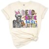 A pastel grunge skull with bunny ears and a playful Easter theme.