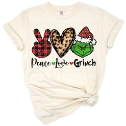 A cheerful green character with peace and heart symbols in Christmas colors.